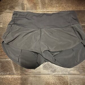 Black lululemon speed up shorts size 4: 2.5”